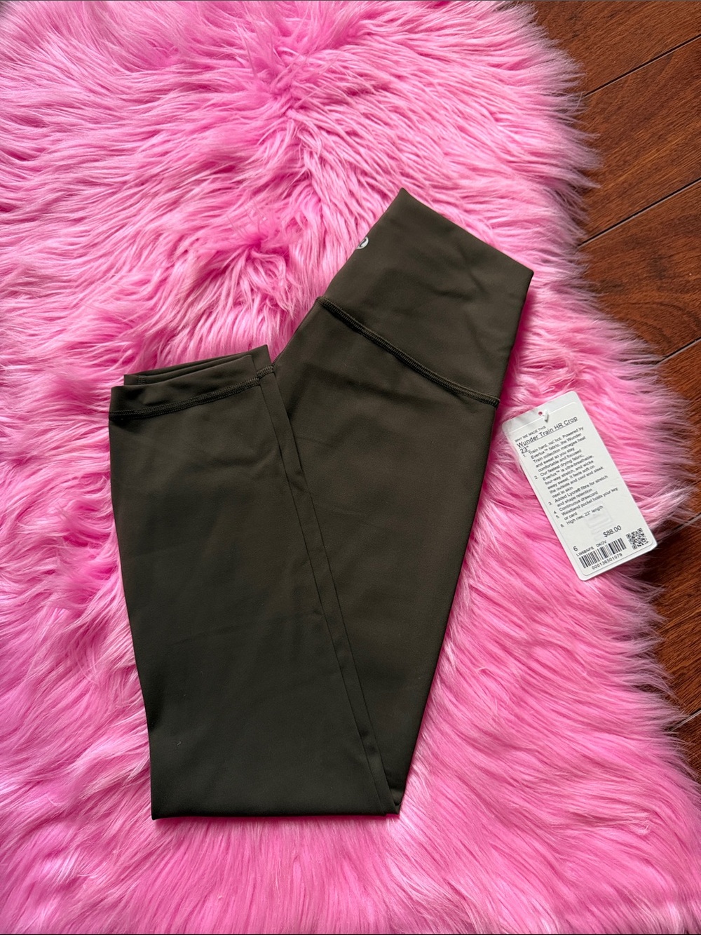 Size 6 Wunder train HR Crop 23” dark olive NWT